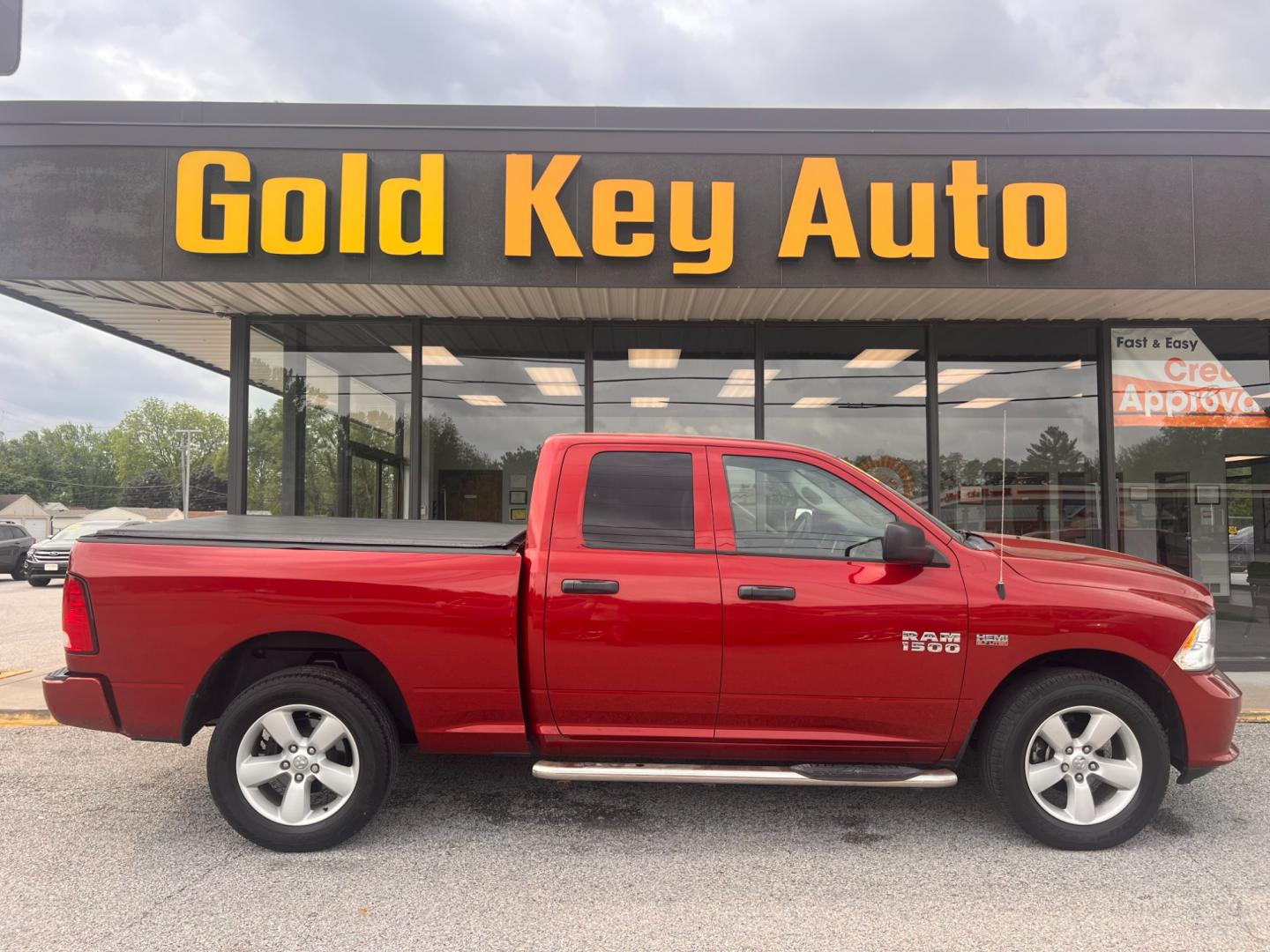 2015 RED RAM 1500 Tradesman Quad Cab 4WD (1C6RR7FT7FS) with an 5.7L V8 OHV 16V engine, 8-Speed Automatic transmission, located at 1633 W Kimberly, Davenport, IA, 52806, (563) 323-5341, 41.559456, -90.598732 - Photo#0
